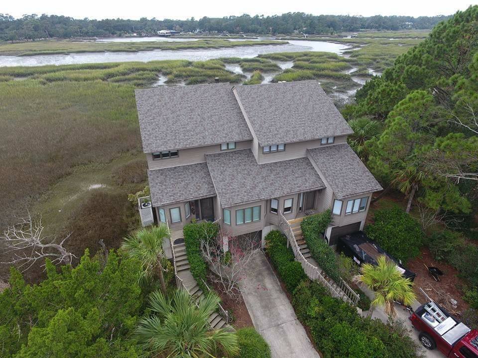 Slide of Grassi Roofing