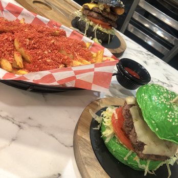 Burger Station - Station Burger (black) Spicy Burger (green) - Burgers Near Me - Clifton, New Jersey