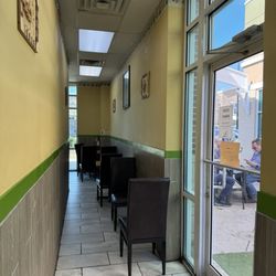 Inside, some tables and seating - March 2026