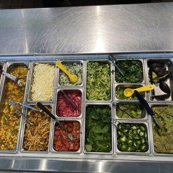 California Tortilla - Toppings.  Pico, corn salad, mango salsa, veggies and fixings. Photos taken 2/26/2022 - Mexican Near Me - Charleston, South Carolina