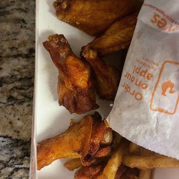 Popeyes Louisiana Kitchen - a close up of a box of fries - Fast Food Near Me - Mcdonough, Georgia Popeyes Louisiana Kitchen - a close up of a box of fries - Fast Food Near Me - Mcdonough, Georgia
