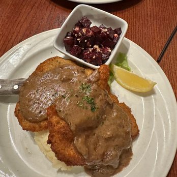 Henry's Pub - Pork Schnitzel, garlic mashed potatoes, beets with sunflower seeds and feta. - American Near Me - Loveland, Colorado Henry's Pub - Pork Schnitzel, garlic mashed potatoes, beets with sunflower seeds and feta. - American Near Me - Loveland, Colorado