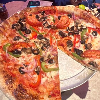 Bubba's 33 - 12 inch veggie pizza was stone- fire cooled. The crust was so light and flavorful. - American Near Me - Killeen, Texas