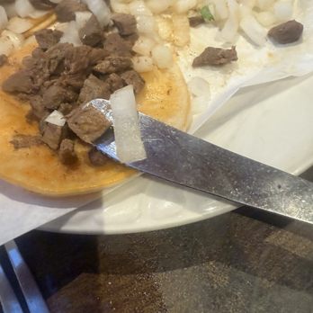 Casa Orozco - Livermore - These are their carne asada tacos.  The onions were bigger than the meat.  Do better casa O!! This is ridiculous.  Service was bad too - Mexican Near Me - Livermore, California