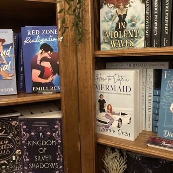 Folklore Grove Bookstore - Selection of romance novels face out on wooden bookshelves. - Bookstores Near Me - Arlington, Texas Folklore Grove Bookstore - Selection of romance novels face out on wooden bookshelves. - Bookstores Near Me - Arlington, Texas