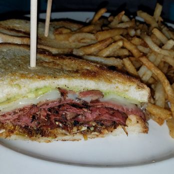 Yard House - California Reuben with pastrami, swiss cheese, fried cabbage. - New American Near Me - Irvine, California Yard House - California Reuben with pastrami, swiss cheese, fried cabbage. - New American Near Me - Irvine, California