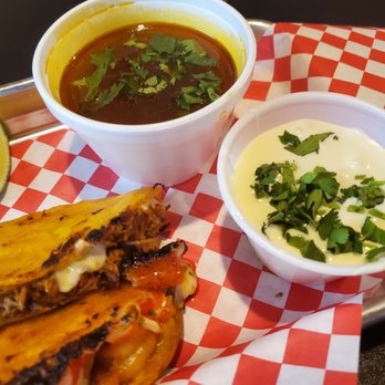 Los Chapos Tacos - Mar y Tierra comes with queso fondue. I added the birria broth for an extra charge. - New Mexican Cuisine Near Me - Brandon, Florida Los Chapos Tacos - Mar y Tierra comes with queso fondue. I added the birria broth for an extra charge. - New Mexican Cuisine Near Me - Brandon, Florida