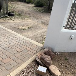 USPS - Surprise - This area gets flooded when it rains. This is where our lazy driver just dropped off the package.
