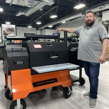 Texas Star Grill Shop - ryan with yoder ys 640s with orange competition cart at texas star grill shop - Grilling Equipment Near Me - Spring, Texas Texas Star Grill Shop - ryan with yoder ys 640s with orange competition cart at texas star grill shop - Grilling Equipment Near Me - Spring, Texas