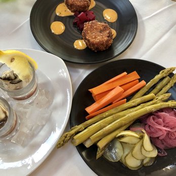 Bridgewater Bistro - Oyster shooters (yum), seafood cakes of the day (delicious), and pickled veggies (way too intense/didn't like) - New American Near Me - Astoria, Oregon