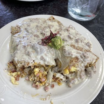 Annie’s Cafe - The R.I.C! A breakfast scramble inside a crepe and covered in sausage gravy - Creperies Near Me - Bountiful, Utah Annie’s Cafe - The R.I.C! A breakfast scramble inside a crepe and covered in sausage gravy - Creperies Near Me - Bountiful, Utah