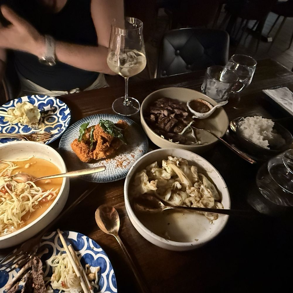 Papaya salad, mala spiced chicken wings, Thai cabbage, Tiger ribeye steak. Papaya salad, mala spiced chicken wings, Thai cabbage, Tiger ribeye steak.