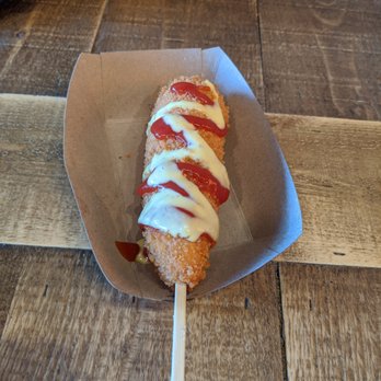 Mochinut - Sausage and mozerella hotdog with mustard and ketchup - Hot Dogs Near Me - Cerritos, California Mochinut - Sausage and mozerella hotdog with mustard and ketchup - Hot Dogs Near Me - Cerritos, California
