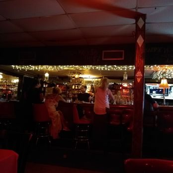 Verret's Bar and Lounge - people sitting at the bar - Dive Bars Near Me - New Orleans, Louisiana