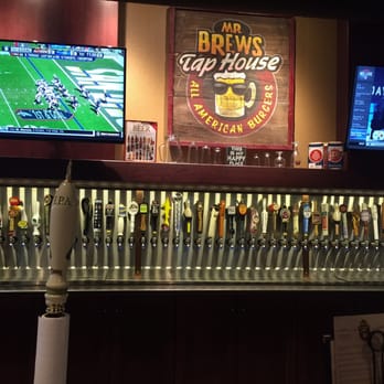 Mr Brews Taphouse - a row of beer taps - American Near Me - Plover, Wisconsin Mr Brews Taphouse - a row of beer taps - American Near Me - Plover, Wisconsin