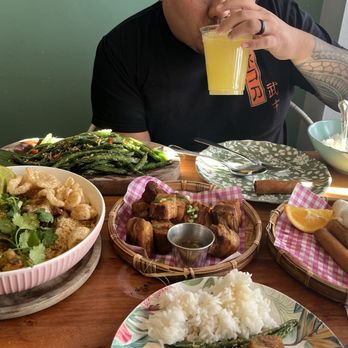 Kamayan Atl - Pancit palabok, wok fried green beans, lechon kawali, steamed white rice, calamansi juice, and pork lumpia - Filipino Near Me - Doraville, Georgia