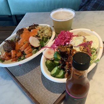 Brassica - Left is salad, half falafel half chicken with red pepper sauce. Right is chicken salad with yogurt sauce. - Salad Near Me - Westlake, Ohio