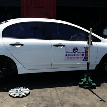 S Pass Driving School - Car getting new tires - Driving Schools Near Me - South Pasadena, California S Pass Driving School - Car getting new tires - Driving Schools Near Me - South Pasadena, California