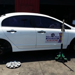S Pass Driving School - Car getting new tires