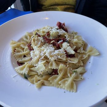 Louie Linguini's - Bow Ties with artichokes and dried tomatoes - Seafood Near Me - Monterey, California Louie Linguini's - Bow Ties with artichokes and dried tomatoes - Seafood Near Me - Monterey, California