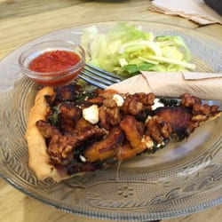 The No Grainer - Lunch: a yummy pumpkin, kale & walnut pizza - gluten-free & served with a side salad.