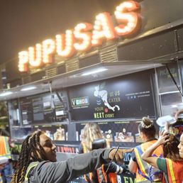 a group of people ordering food