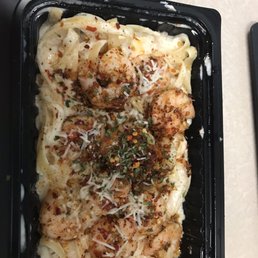 Spicy Shrimp Alfredo. Two layers of shrimp in here and I didn't expect that either. Amazing food!! Spicy Shrimp Alfredo. Two layers of shrimp in here and I didn't expect that either. Amazing food!!