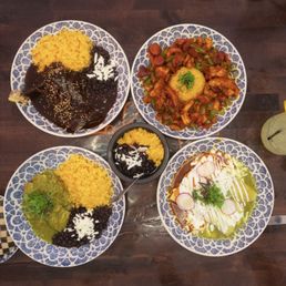 Pollo en Mole (top left), Mexican Jambalaya (top right), Enchiladas verdes (bottom right)