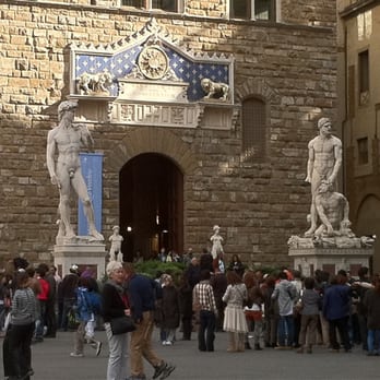 Piazza della Signoria - Entrance to Palazzo Vecchio, Replica of David statue on the left and Hercules and Cacus, by Baccio Bandinelli on the right. - Public Plazas Near Me - Florence, FI Piazza della Signoria - Entrance to Palazzo Vecchio, Replica of David statue on the left and Hercules and Cacus, by Baccio Bandinelli on the right. - Public Plazas Near Me - Florence, FI