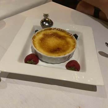 Firefly - Creme Brûlée. Fired at the table. Very festive presentation - Steakhouses Near Me - Panama City Beach, Florida Firefly - Creme Brûlée. Fired at the table. Very festive presentation - Steakhouses Near Me - Panama City Beach, Florida