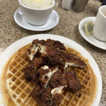 Lincoln's Waffle Shop - Chicken tenders on waffle with grits - American Near Me - Washington, DC, District of Columbia