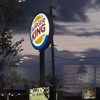 Burger King - a burger king sign at night - Burgers Near Me - Pensacola, Florida