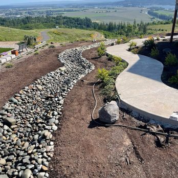 Schlappi Construction - A nice deep trench was dug. Cody the. installed landscape fabric and meticulously placed the rocks on top. - Excavation Services Near Me - Woodland, Washington Schlappi Construction - A nice deep trench was dug. Cody the. installed landscape fabric and meticulously placed the rocks on top. - Excavation Services Near Me - Woodland, Washington