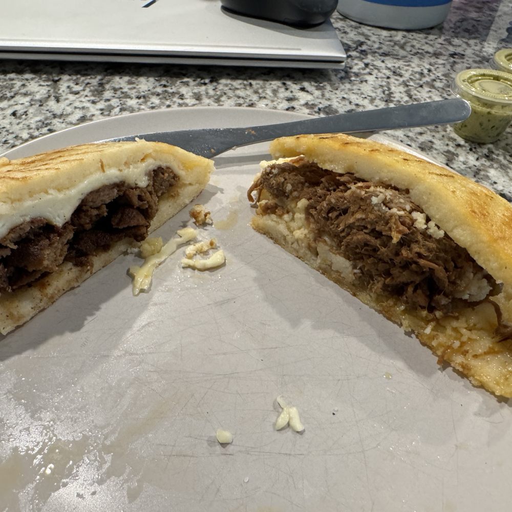 This is the carne asada with a grilled cheese slice (left) and shredded beef with shredded white cheese both cut in half to show the inside. This is the carne asada with a grilled cheese slice (left) and shredded beef with shredded white cheese both cut in half to show the inside.