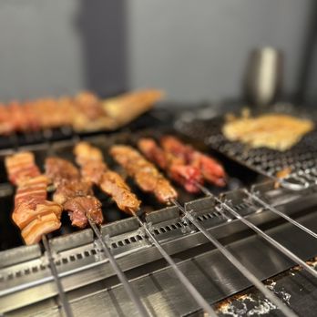 Honolulu Skewer House - bacon on a grill - Chinese Near Me - Honolulu, Hawaii