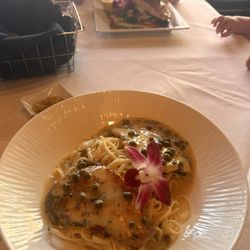 Alfresco Italian Bistro - Chicken piccata w linguini in front, salmon in back