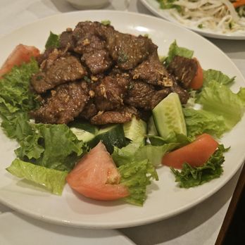 Little Saigon Cuisine - V66. Marinated Beef cubes on salad, rice on the side - Vietnamese Near Me - Little Neck, New York Little Saigon Cuisine - V66. Marinated Beef cubes on salad, rice on the side - Vietnamese Near Me - Little Neck, New York