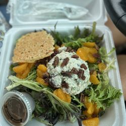 Sweet Kneads Bakery & Cafe - Chicken Salad on a bed of greens served with Parmesan Crisp