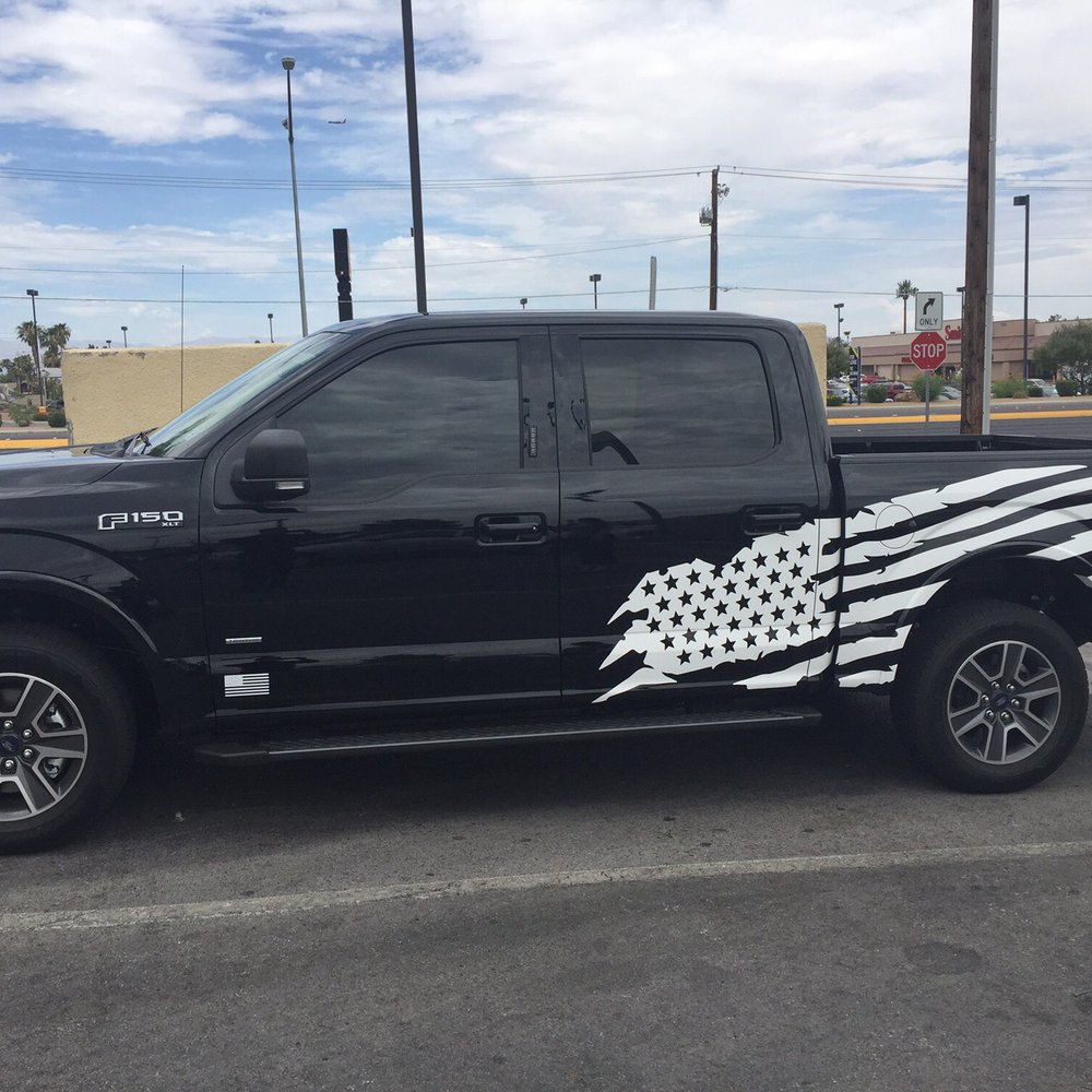 Proffiti Signs & Graphics - White flag on black truck. - Signmaking Near Me - Henderson, Nevada Proffiti Signs & Graphics - White flag on black truck. - Signmaking Near Me - Henderson, Nevada