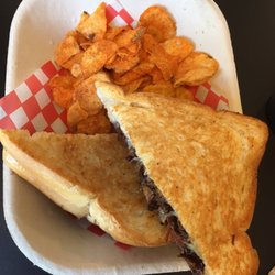 MOO MOO Grilled Cheese - Brisket sandwich with some potato chips - $13.95