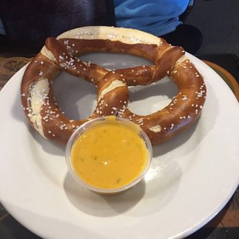 Coasters Pub & Biergarten - Pretzel with beer cheese - Pubs Near Me - Melbourne, Florida Coasters Pub & Biergarten - Pretzel with beer cheese - Pubs Near Me - Melbourne, Florida
