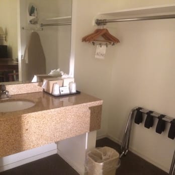 Rio Del Sol Inn - Bathroom sink and closet - Hotels Near Me - Needles, California Rio Del Sol Inn - Bathroom sink and closet - Hotels Near Me - Needles, California