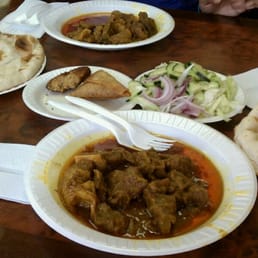 a variety of indian food on a table a variety of indian food on a table