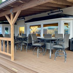 Resurrection Lodge on the Bay - Fantastic porch facing Resurrection Bay. There are blankets and heat lamps.  Just behind the chairs, breakfast is ready each morning.