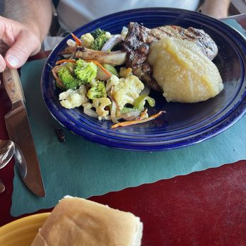 The Rim Rock Restaurant - Pork chop (blob of applesauce on top) - Pizza Near Me - Torrey, Utah The Rim Rock Restaurant - Pork chop (blob of applesauce on top) - Pizza Near Me - Torrey, Utah