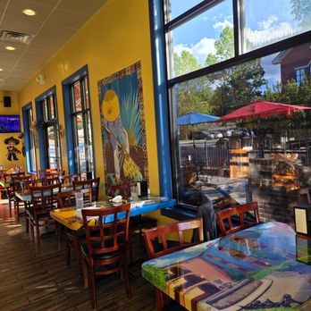 Tacos Rojas - Cave Spring - The colorful tables of the restaurant. - New Mexican Cuisine Near Me - Cave Spring, Virginia