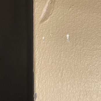 GB Painters Company - 1 of 2 dings on wall - Painters Near Me - Chicago, Illinois