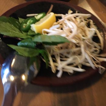 Broken Rice - Thai basil, lemon, bean sprouts, jalapeño peppers for the pho - Vietnamese Near Me - Honolulu, Hawaii Broken Rice - Thai basil, lemon, bean sprouts, jalapeño peppers for the pho - Vietnamese Near Me - Honolulu, Hawaii