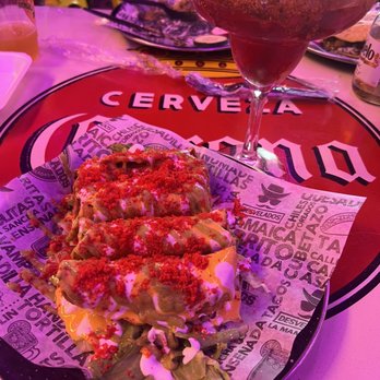 Desvelados - East side tacos (crunchy flauta, nacho cheese, guacamole, hot Cheetos dust), and a chapulin cocktail. - Tacos Near Me - Pasadena, California