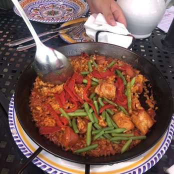 La Tienda Tapas Bar - Chicken and sausage paella - Spanish Near Me - Williamsburg, Virginia La Tienda Tapas Bar - Chicken and sausage paella - Spanish Near Me - Williamsburg, Virginia